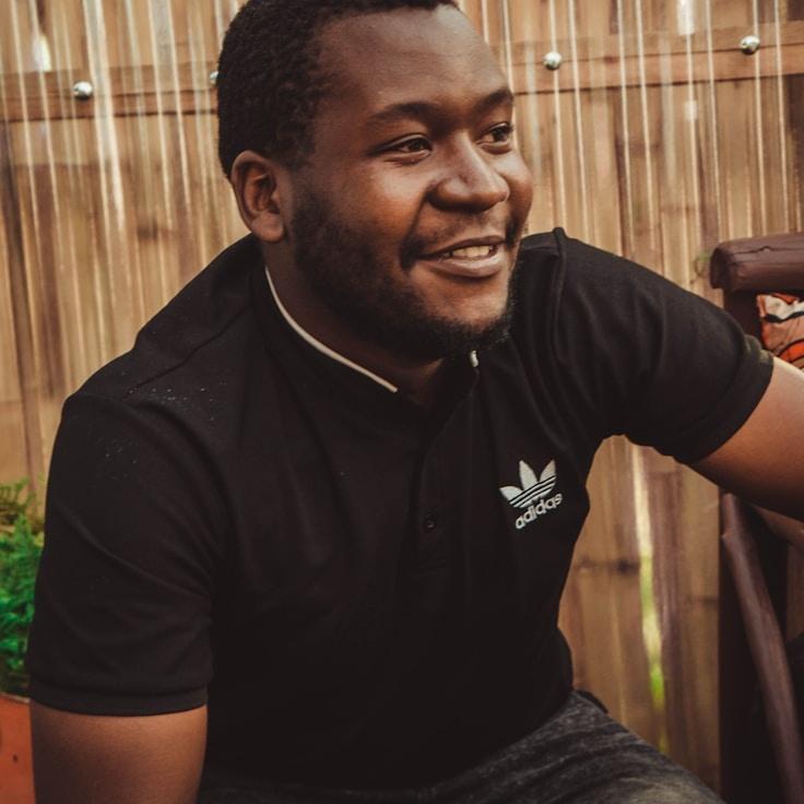 Avery Noor, Lead Design Curator at AtlasVoyageHub, reviewing corporate floral arrangements